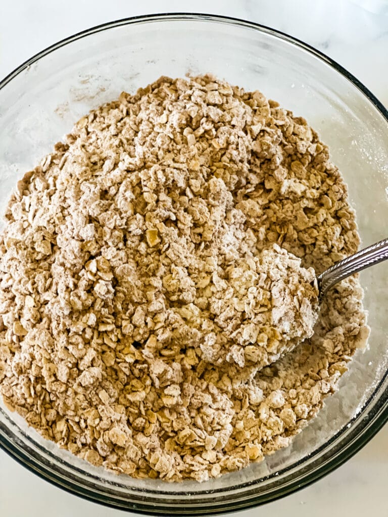 Mixing together the dry ingredients.