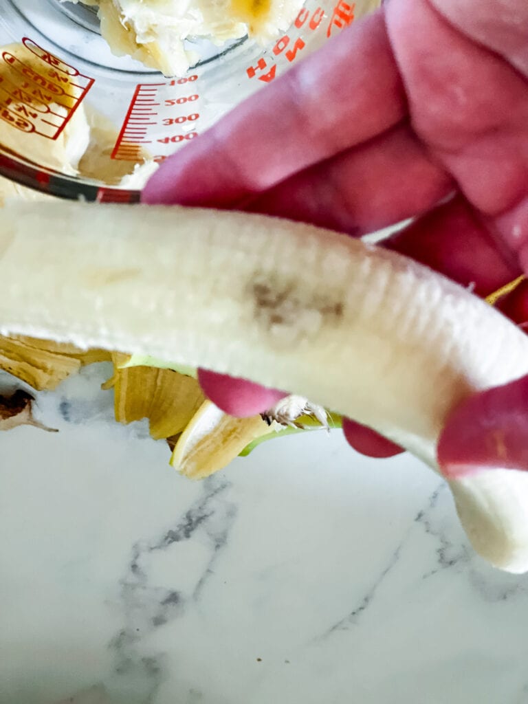 Showing a yucky brown spot on a banana.