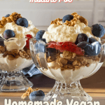 Two glass bowls of vegan greek yogurt topped with blueberries, strawberries, and granola. With Pinterest text overlay.