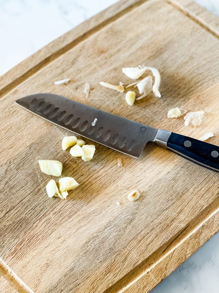 Chopping the garlic.