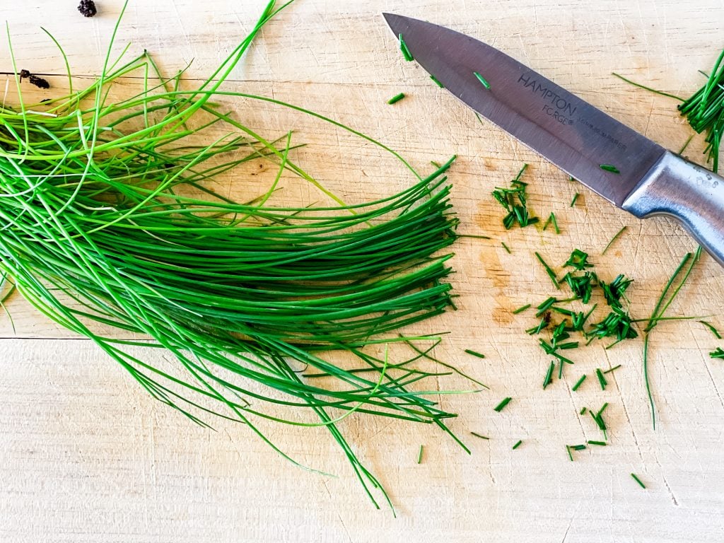 Chopping the fresh chives.