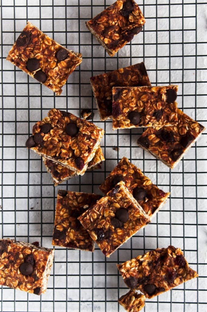 the cut peanut butter oat bars on a wire rack