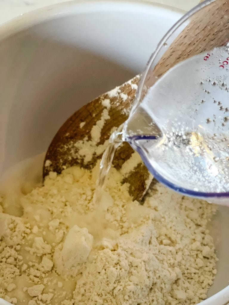 Adding the Sprite water mixture to the Bisquick mix