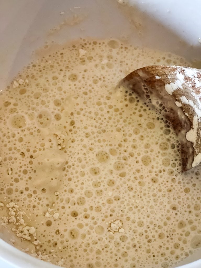 stirring together the pancake batter .