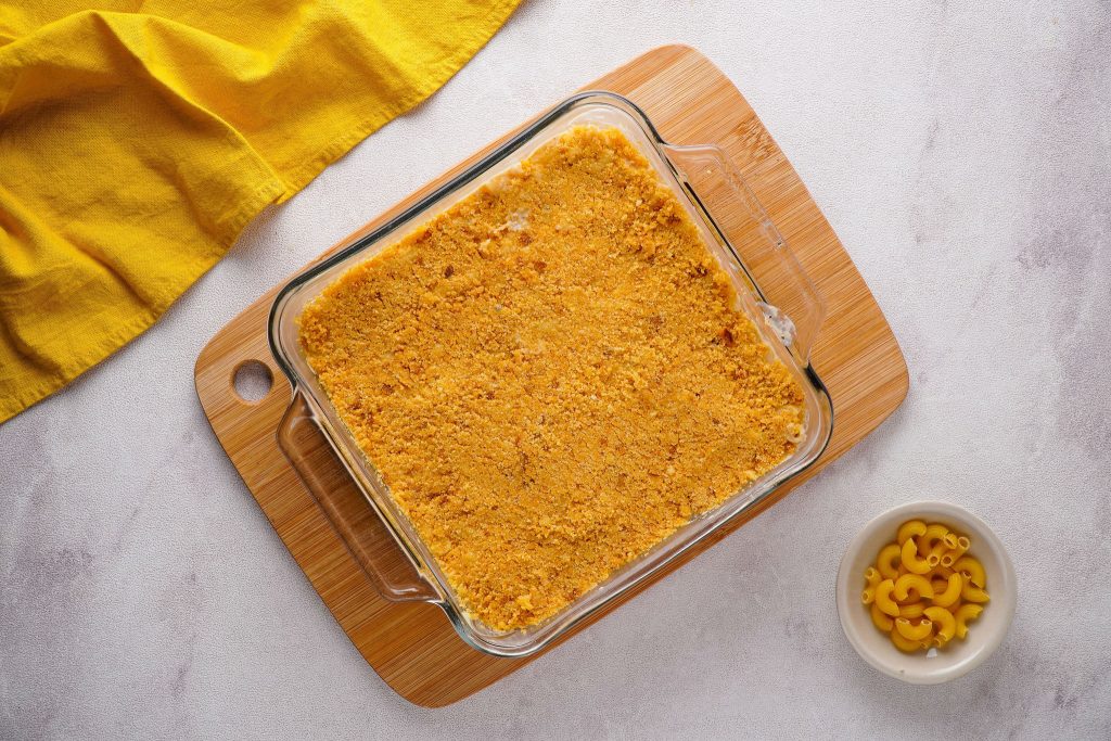 vegan mac and cheese it topped with ritz crackers topping and ready to bake