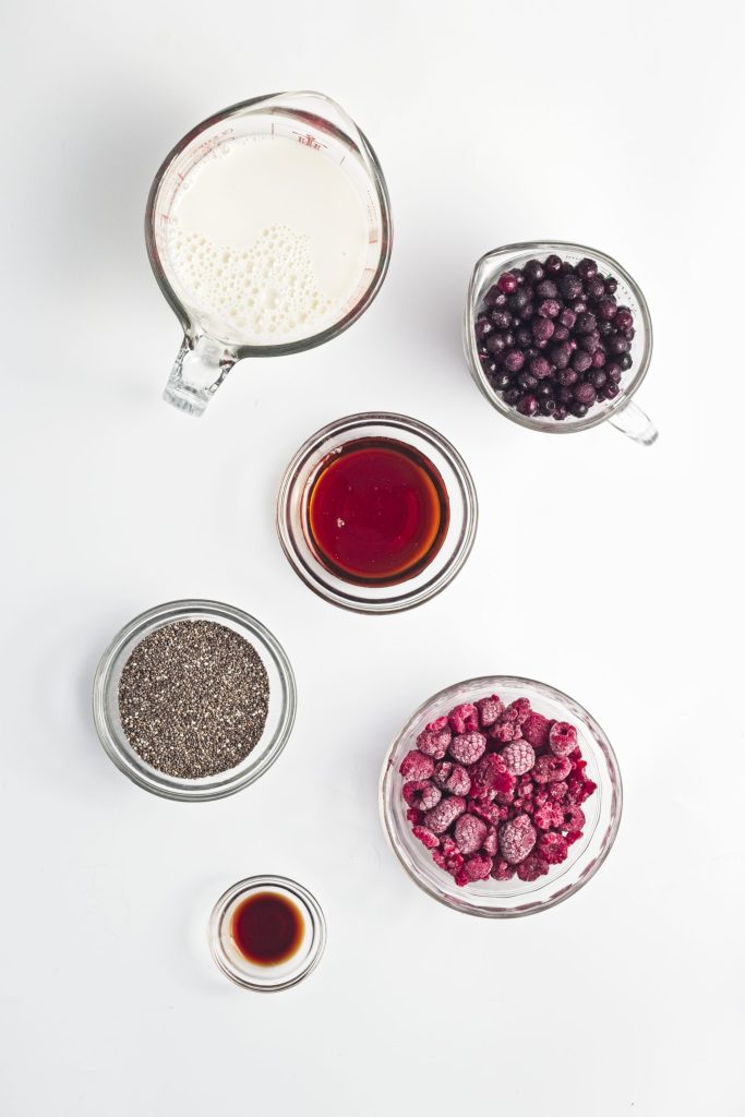 Ingredients for berry chia pudding. Ingredients listed in blog post.