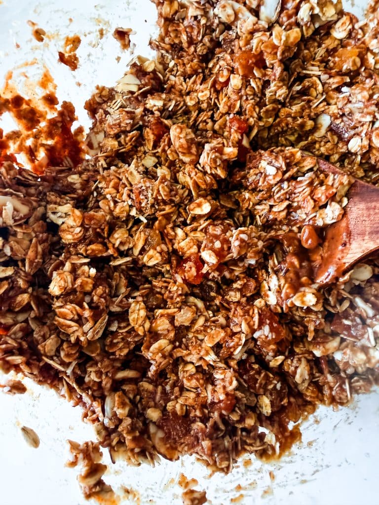 stirring together the oat and almond butter mixture