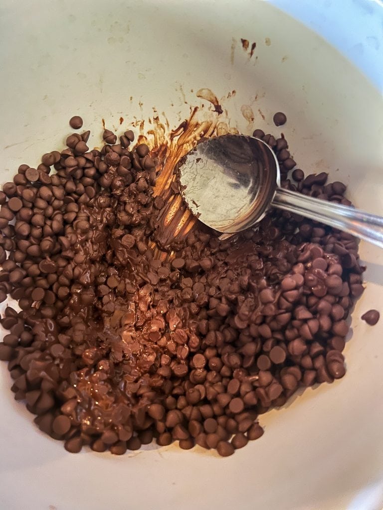 Stirring the melting chocolate chips