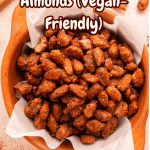 A bowl lined with parchment paper holds sugar-coated almonds. Text over the image reads “Sugar Coated Almonds (Vegan-Friendly).” The “veggie FUN kitchen” logo appears at the bottom.